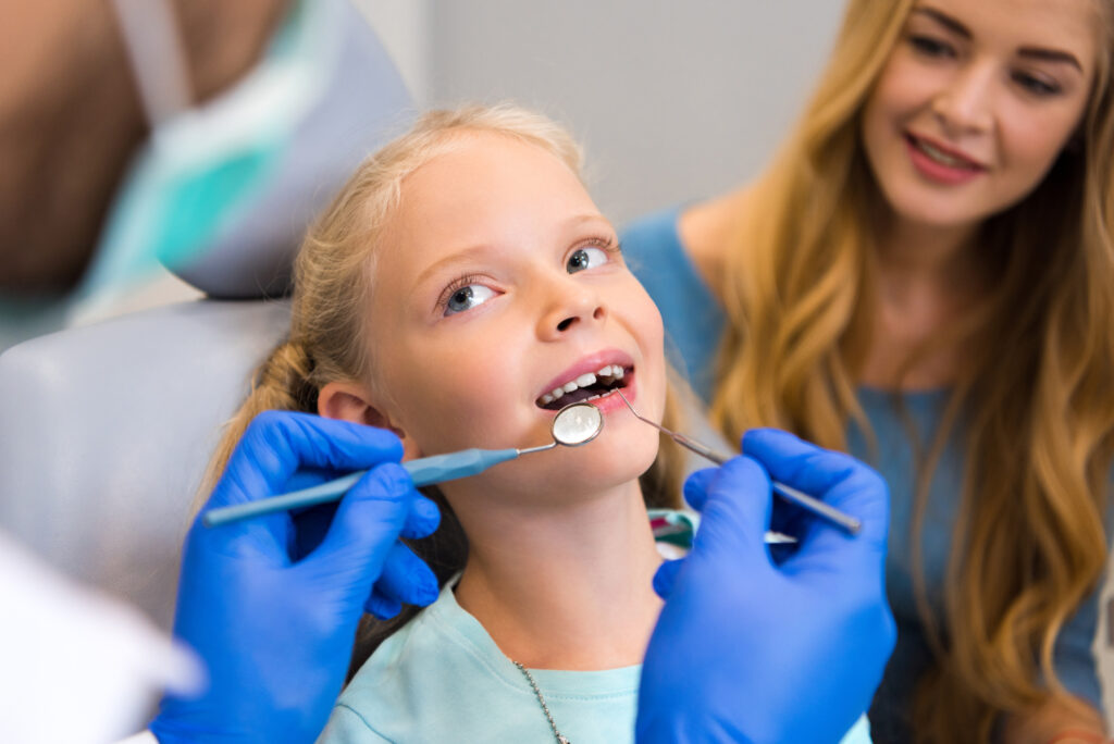 mom and daughter at the orthodontist