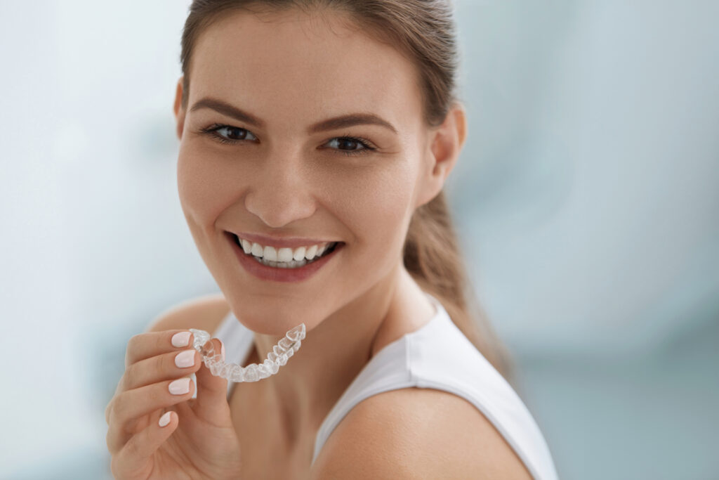 woman with invisalign