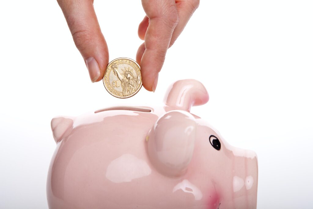 Piggy bank to save for Invisalign costs